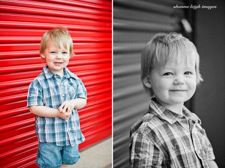 Two year old Kellen photographed downtown Roanoke, Texas with a bright red background.