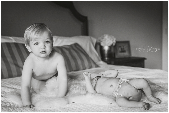In home lifestyle newborn photography with a new family of four in Keller, Texas.