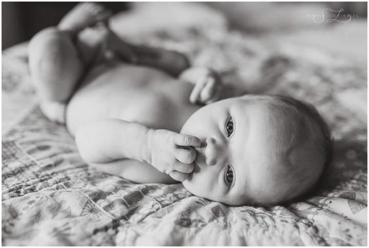 In home lifestyle newborn photography with a new family of four in Keller, Texas.