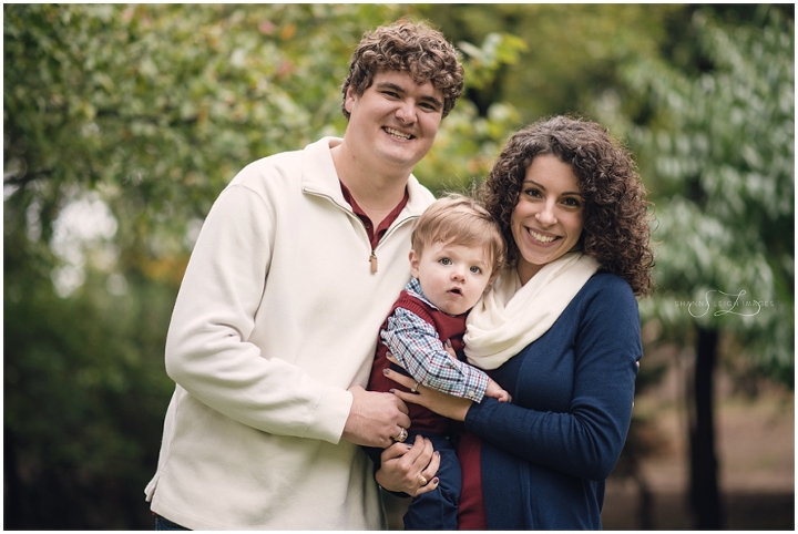 This sweet family with a one year old wore cream, navy, and maroon for their Grapevine family photos at the Grapevine Botanical Gardens.