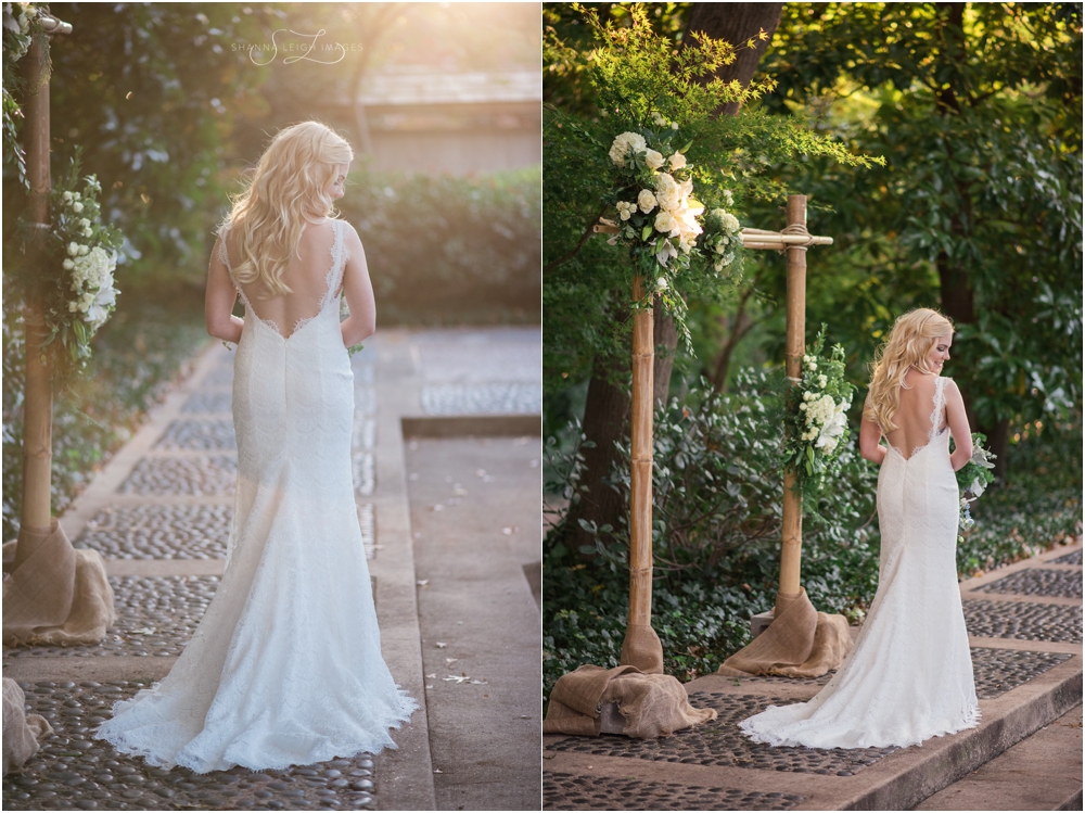 Rachel looked straight out of a fairy tale on her wedding day with her cascading loose blonde curls, her scalloped lace backless Robert Bullock bridal gown from Stardust Celebrations, and her navy blue Christian Louboutin pumps for her gorgeous outdoor wedding at the Japanese Gardens at the Fort Worth Botanical Gardens.