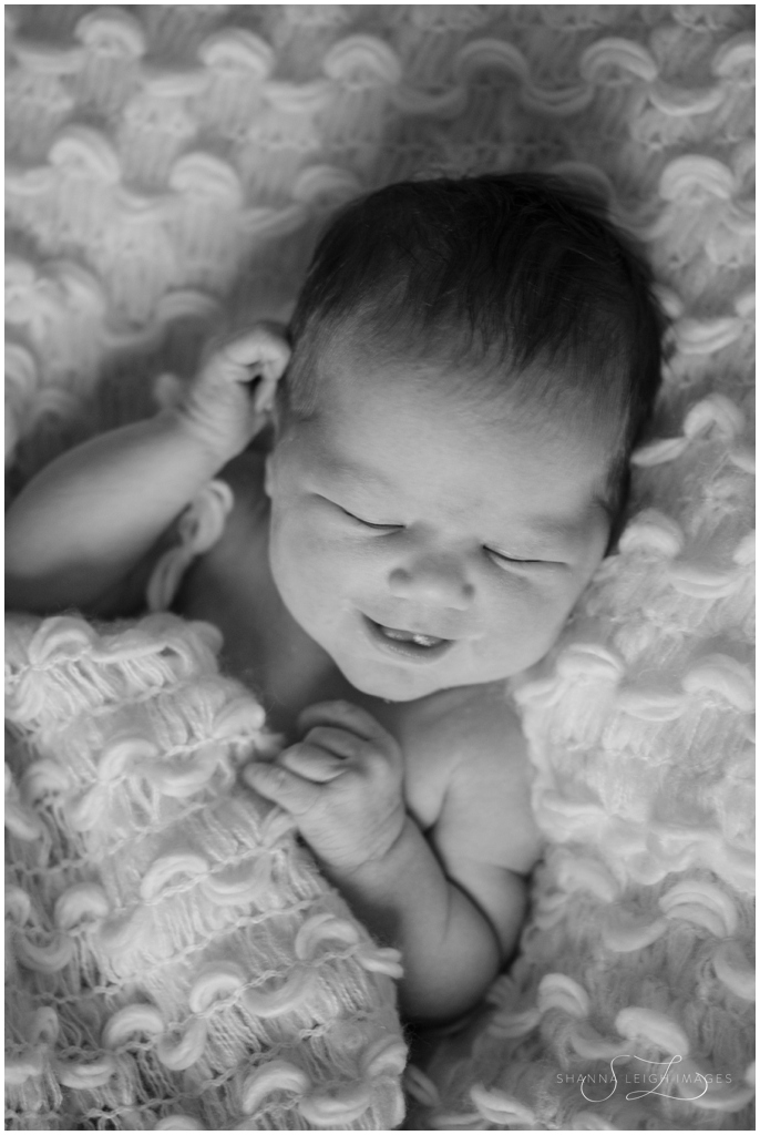 Sweet newborn smile.