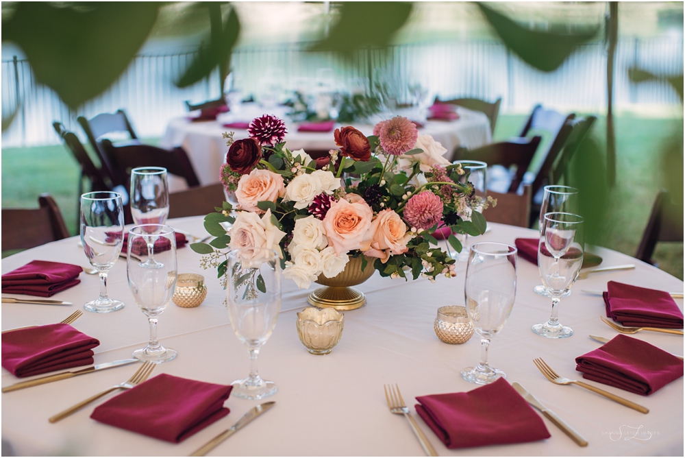 Beautiful hues of deep red, blush, ivory, and gold are perfect for a fall wedding.