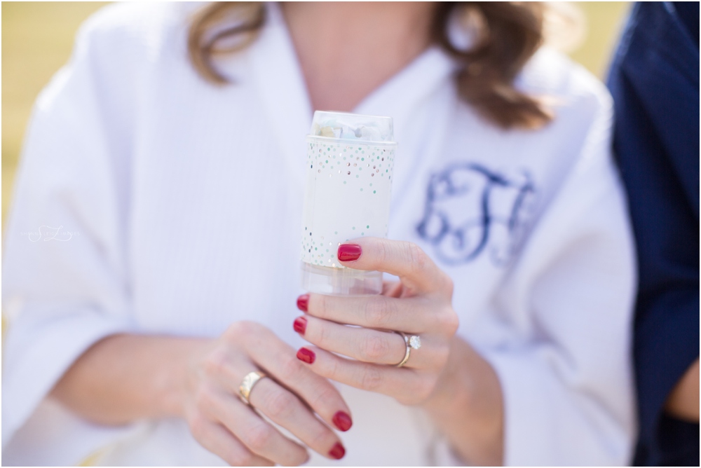 A toast to the bride with confetti pops!